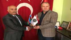 Gülbey, Gevaş MHP Başkanı Altıntaş’ı Ziyaret Etti